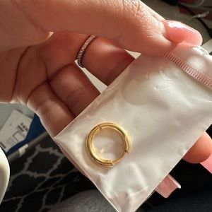 2 gold hoop earrings